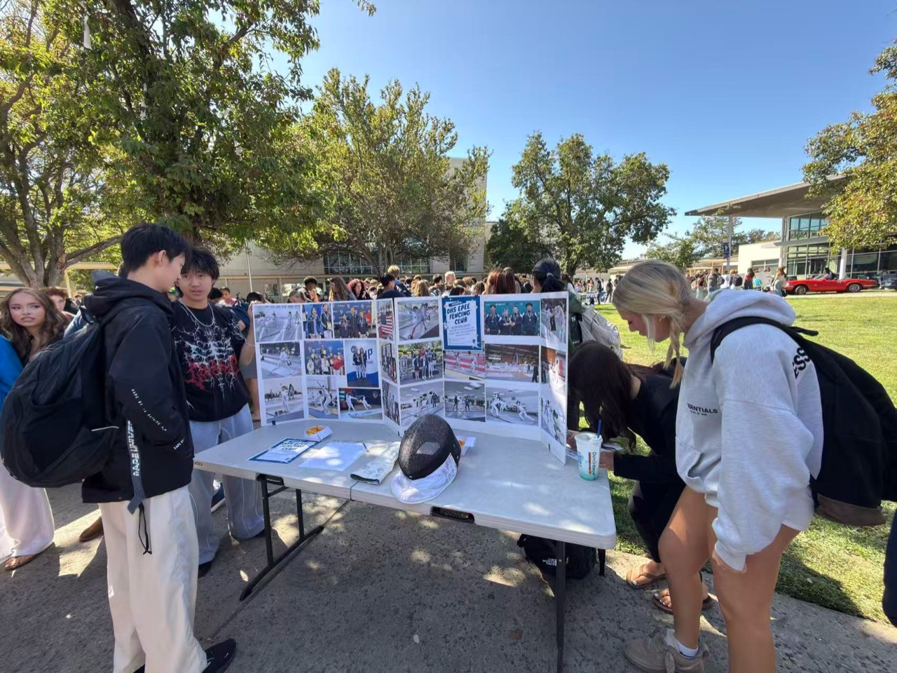 The Davis High School Épée Fencing Club display during lunch